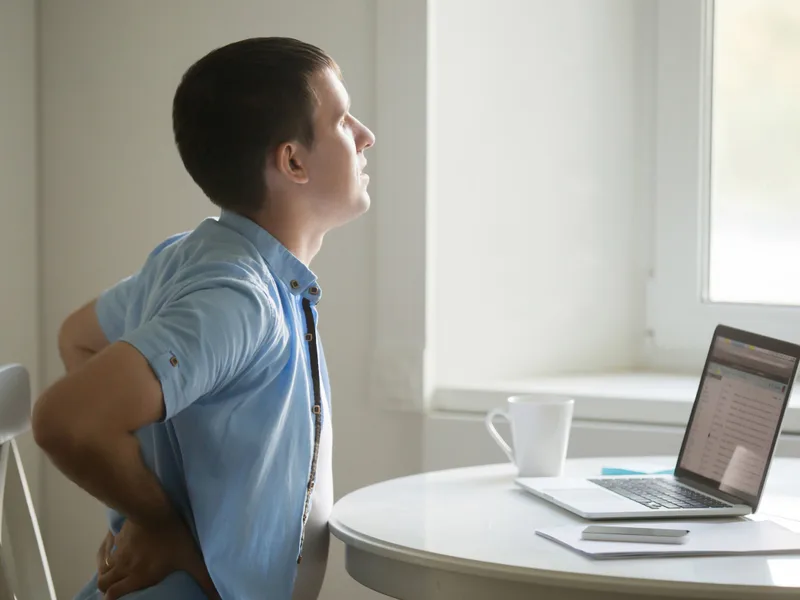 Strong Roots Chiropractic treating back pain in Eureka
